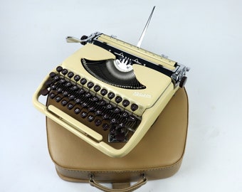Rara macchina da scrivere vintage GROMA Kolibri, avorio, macchina da scrivere GDR con istruzioni per l'uso - Ottime condizioni