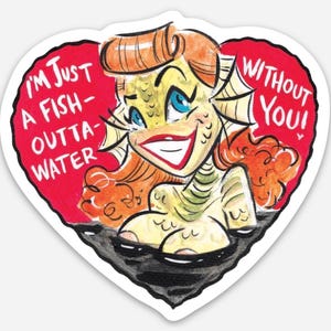 May include: A heart-shaped sticker featuring a cartoon illustration of a fish-like woman with orange hair and blue eyes. The text "I'M JUST A FISH-OUTTA-WATER WITHOUT YOU!" is written on the red background.