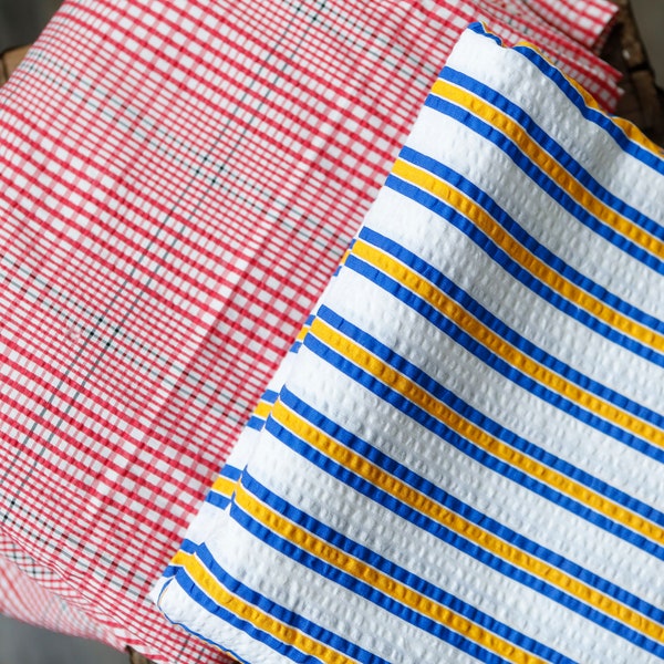 Vintage seersucker fabrics: Red, blue white plaid cotton synth blend / white w blue yellow stripes seersucker