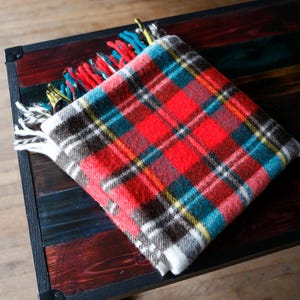 Vintage red, yellow, green and brown plaid wool blanket. No tag- 1960's wool 58"x52"