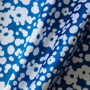 Royal blue with white abstract flowers vintage synthetic blend lining or clothing fabric