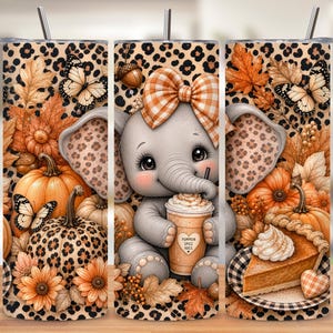 May include: A cylindrical tumbler featuring a gray elephant with a plaid bow, holding a coffee cup labeled Pumpkin Spice Hugs. The design includes leopard print, orange pumpkins, autumn leaves, butterflies, and a slice of pumpkin pie.