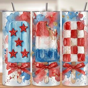 May include: Three stainless steel tumblers with patriotic popsicle designs. One features a blue popsicle with red stars, another a red, white, and blue popsicle with a bite taken out, and the last a red and white checkerboard popsicle. Each has a red bow.