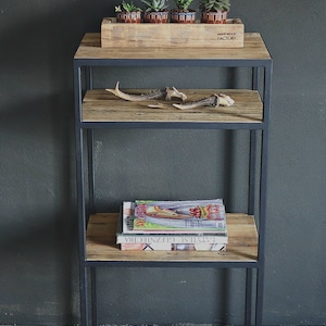 industrial metal shelving unit with reclaimed wood shelves