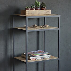 industrial metal shelving unit with reclaimed wood shelves