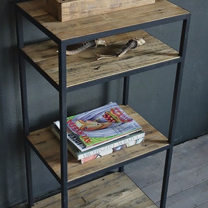 industrial metal shelving unit with reclaimed wood shelves