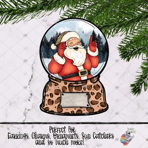 May include: A digital illustration of a snow globe with a Father Christmas inside. The snow globe is decorated with a leopard print pattern. The text "PERFECT FOR Earrings, Charms, Ornaments, Sun Catchers and so much MORE!" is below the snow globe.