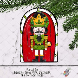 May include: A digital illustration of a nutcracker standing in a red door with a candy cane border. The nutcracker is wearing a green and gold uniform with a crown and a wreath around his head. The text "PERFECT FOR Earrings, DECOR, GIFTS, Ornaments, and so much MORE!" is below the image.