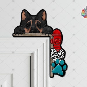 May include: A black and brown dog peeking around a corner with a red fire hydrant, black and white polka dot fabric, and a blue paw print.