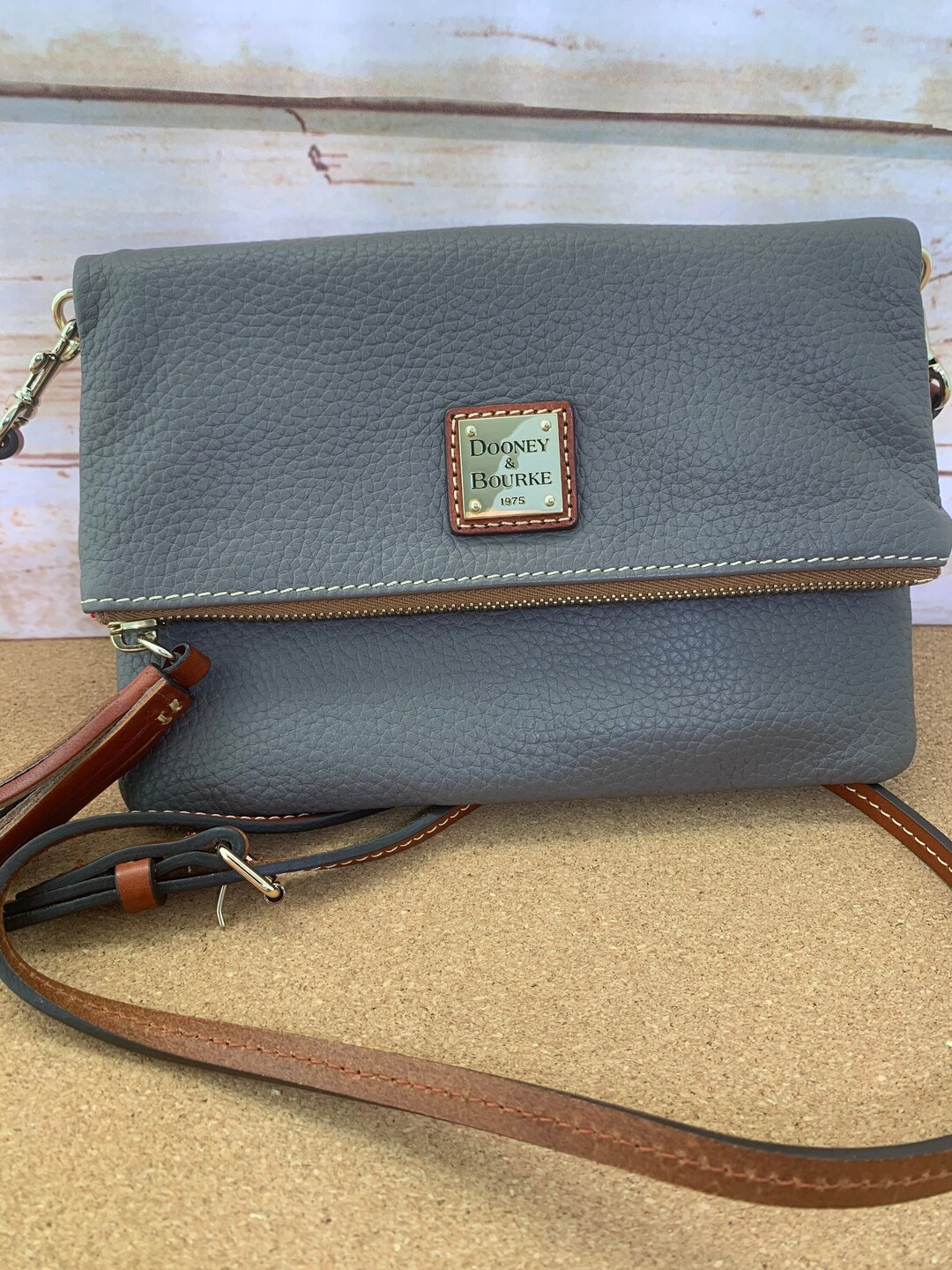 dooney & bourke pebble foldover zip crossbody