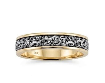 Anillo esculpido del río CASCADE, con motivos góticos de volutas naturales.