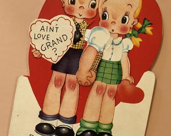 Vintage Children&#39;s Mechanical Valentine | Little Boy and Little Girl Holding Hands with Box of Heart Candies