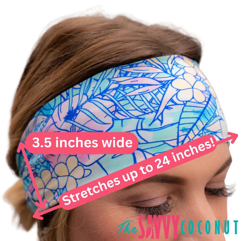 May include: A blue and white floral headband with a tropical print. It is 3.5 inches wide and stretches up to 24 inches.