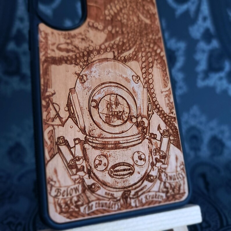 Octopus wood case for iPhone 17 Pro Max featuring a vintage diving helmet and sailing ship