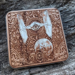 Laser-engraved wood wireless charger featuring a galactic spacecraft and celestial design. Fast 15W Qi charging for iPhone 16, Galaxy S25 & all Qi-enabled phones.