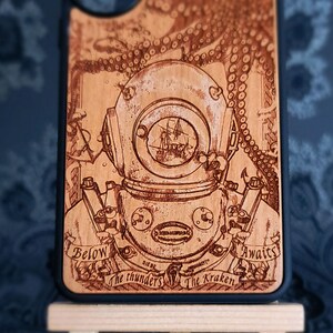 Close-up of Kraken tentacles surrounding a deep sea diving helmet with detailed nautical engraving on real wood