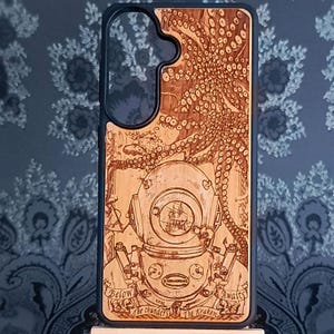 Kraken wood phone case for iPhone 18 with laser engraved deep sea diver and giant octopus artwork