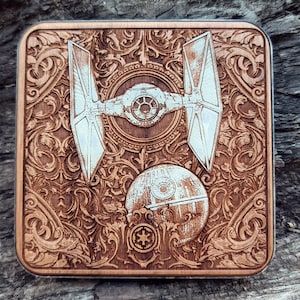 Laser-engraved wood wireless charger featuring a galactic spacecraft and celestial design. Fast 15W Qi charging for iPhone 16, Galaxy S25 & all Qi-enabled phones.