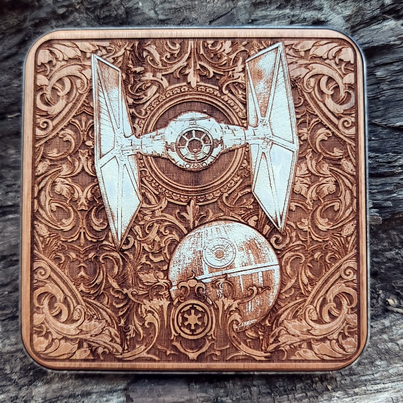 Laser-engraved wood wireless charger featuring a galactic spacecraft and celestial design. Fast 15W Qi charging for iPhone 16, Galaxy S25 & all Qi-enabled phones.