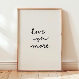 Handwritten Love You More print, minimalist romantic typography poster for bedroom or couple wall decor, black and white printable art.
