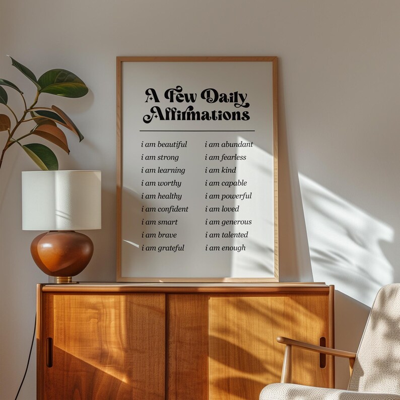 May include: A framed print with the text "A Few Daily Affirmations" and a list of positive affirmations, such as "I am beautiful", "I am strong", and "I am grateful".