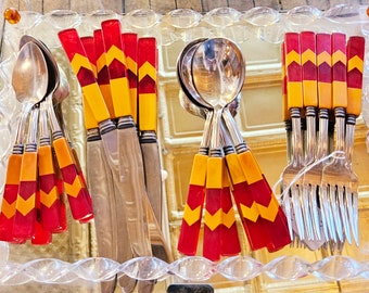 Art Deco Era Cherry and Butterscotch Bakelite Flatware Set in a rare Chevron Pattern Bakelite silverware