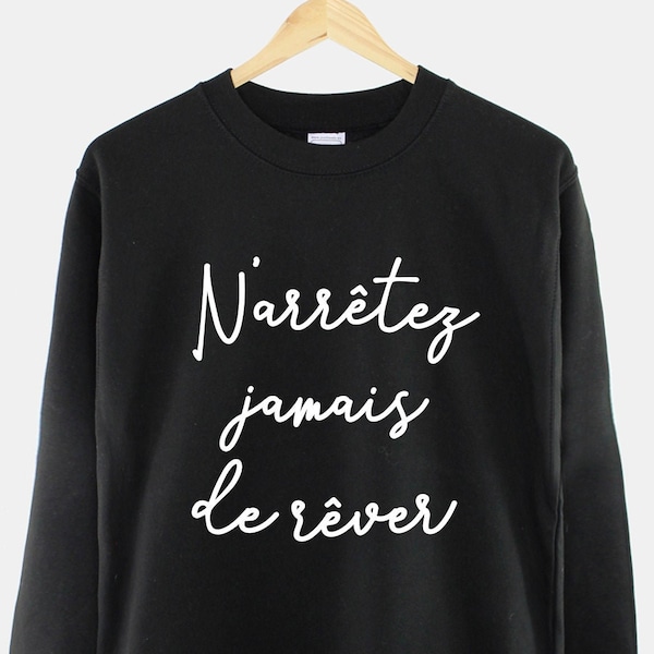 Sudadera francesa con el lema inspirador "Nunca dejes de soñar".