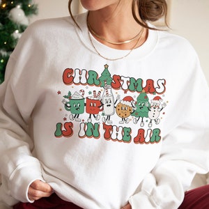 Retro Weihnachts Sweatshirt - Frauen Weihnachtspullover - Weihnachten ist in der Luft Festliches Sweatshirt - Retro Weihnachtszeichen Sweatshirt