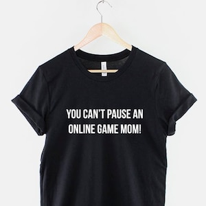 May include: Black t-shirt with white text that reads "You can't pause an online game mom!"