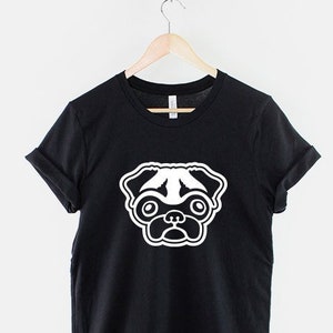 May include: Black t-shirt with a white pug face graphic.