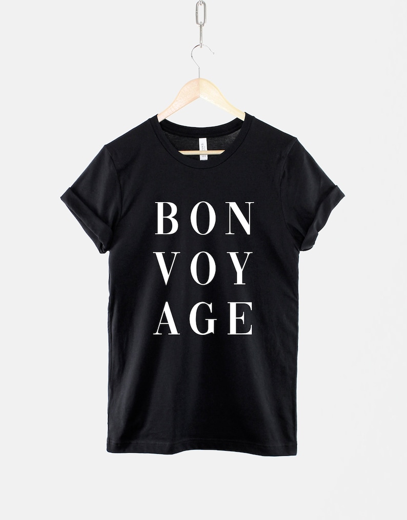 23 Best Travel Gifts for Her featured by top US travel blogger, Marcie in Mommyland: Bonvoyage TShirt / Travel Gift For Her / Adventure Awaits image 0