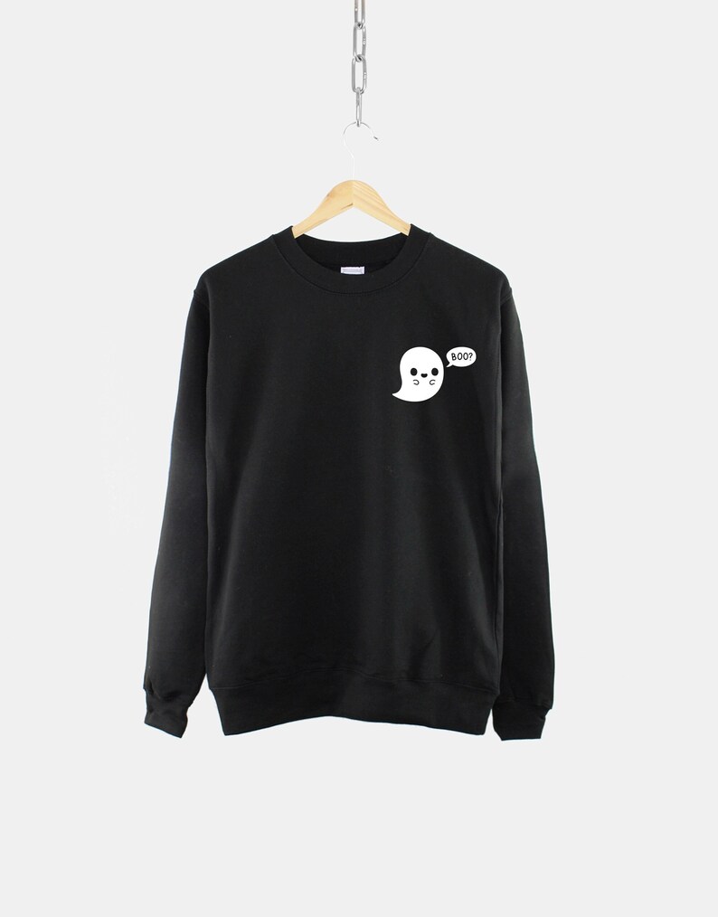 May include: Black sweatshirt with a white ghost graphic and the text "BOO?" in a speech bubble.