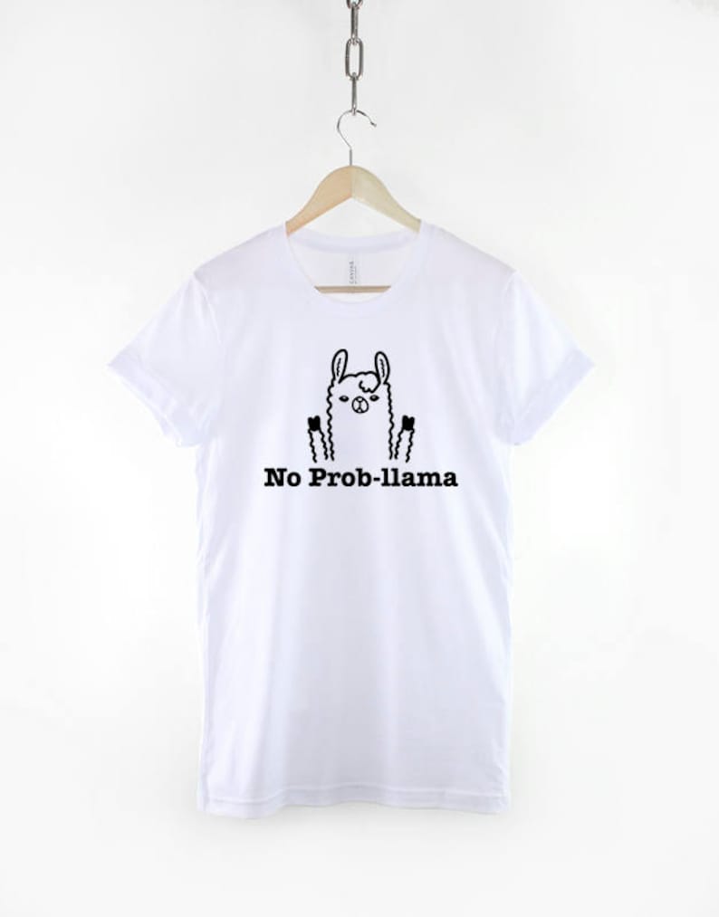 May include: White t-shirt with a black and white illustration of a llama with the text "No Prob-llama" printed on the front.