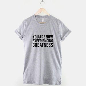 Greatness Slogan – Cotton Tee: Urban Streetwear, Soft Unisex Shirt image 2