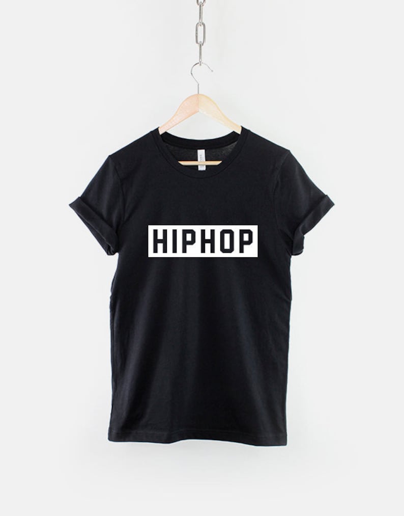 May include: Black t-shirt with the word "HIPHOP" printed in white on the front.
