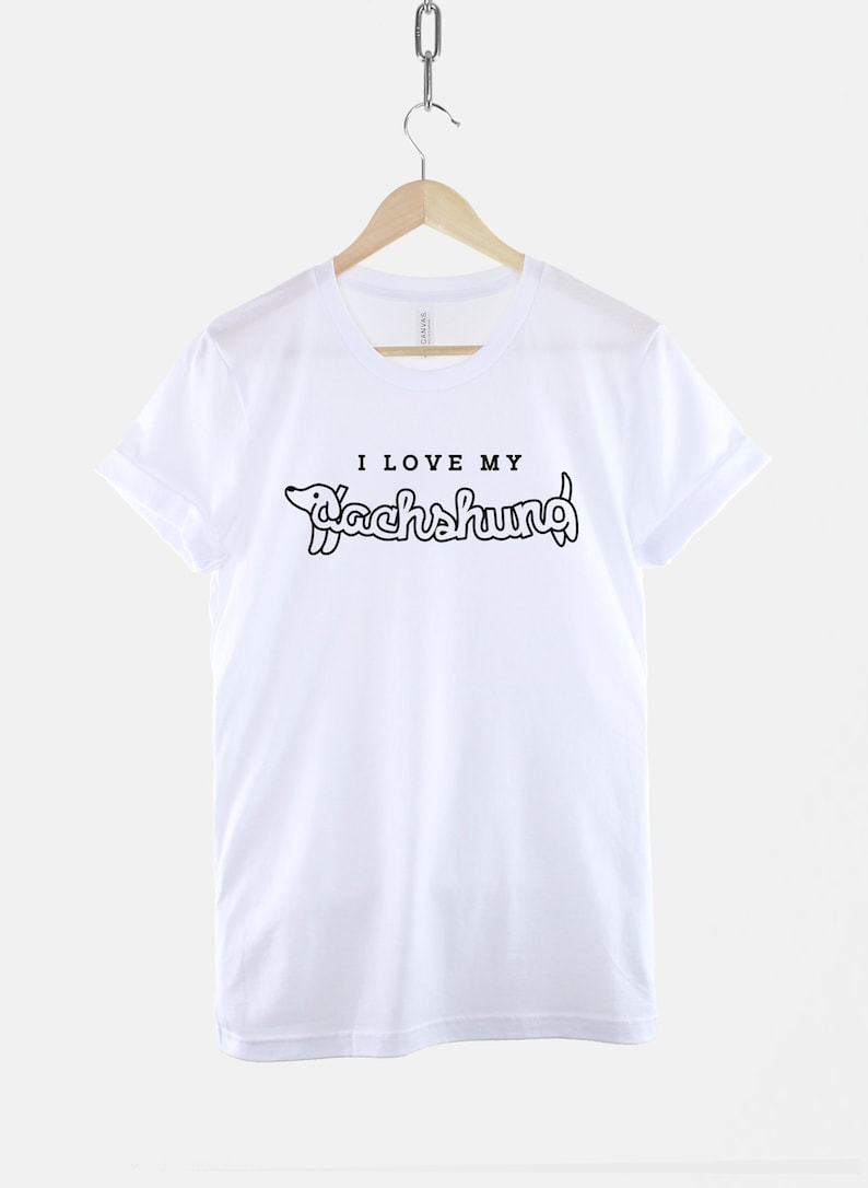 May include: White t-shirt with black text that reads "I love my Dachshund" with a cartoon dachshund illustration.