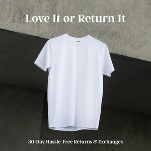 A white t-shirt is hanging on a concrete wall, with the text "Love It or Return It" displayed above it.