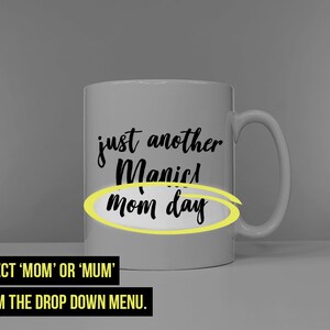 May include: White ceramic mug with black text that reads "just another manic mom day" with the word "mom" circled in yellow.