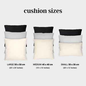 May include: Three different sizes of cushions are shown. The largest cushion is 50 x 50 cm (20 x 20 inches), the medium cushion is 40 x 40 cm (16 x 16 inches), and the smallest cushion is 50 x 30 cm (20 x 12 inches).