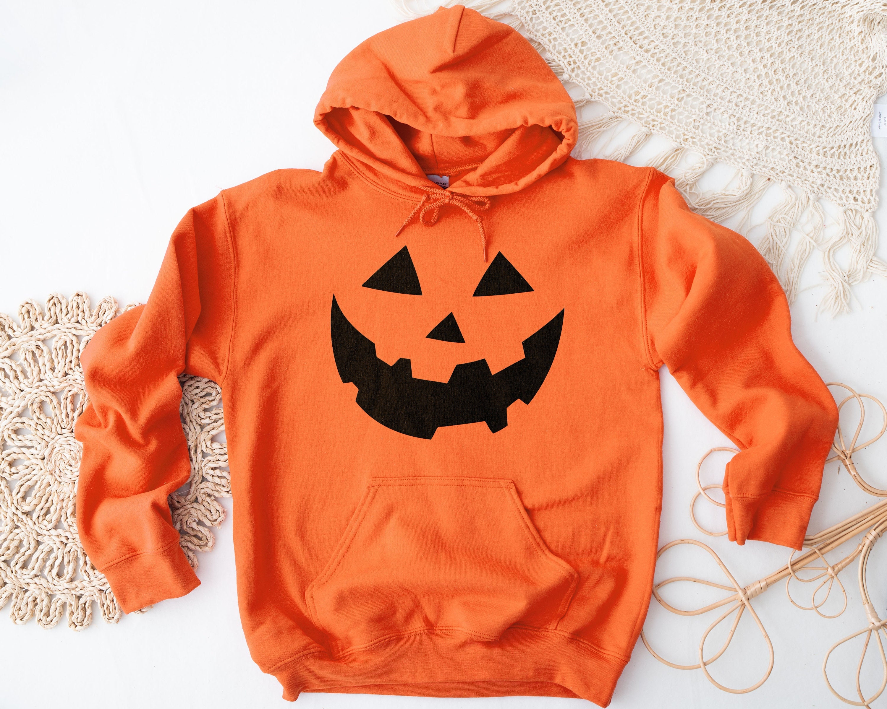 Discover Orange Pumpkin Face Halloween Hoodie