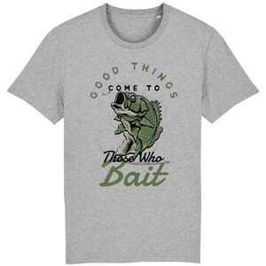 May include: Gray t-shirt with a green illustration of a fish on a hook. The text "Good things come to those who bait" is printed on the shirt.
