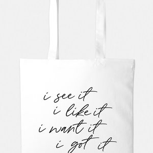 May include: White canvas tote bag with black text that reads "i see it i like it i want it i got it".