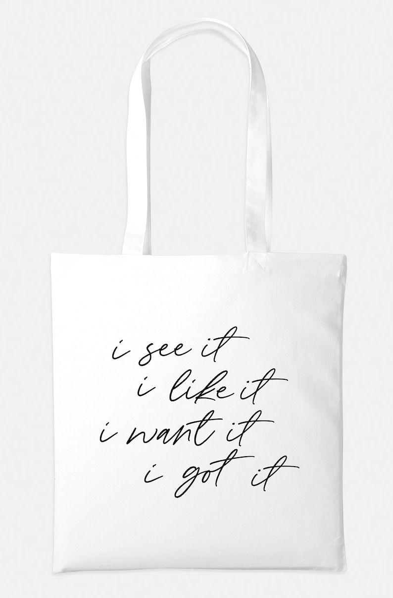 May include: White canvas tote bag with black text that reads "i see it i like it i want it i got it".