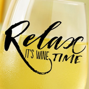 May include: A glass of white wine with the text "Relax It's Wine Time" on the side.