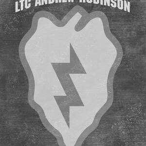May include: A black and white image of a military patch with a lightning bolt design. The text "LTC ANDREW ROBINSON" is at the top of the patch.
