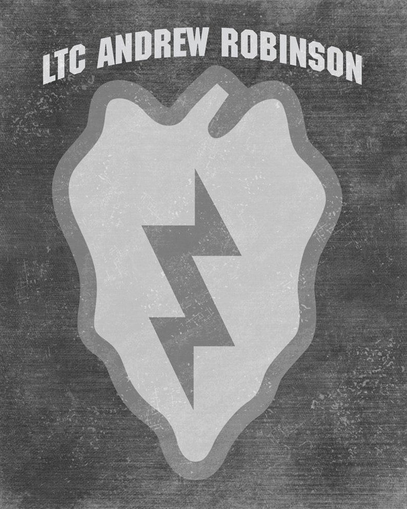 May include: A black and white image of a military patch with a lightning bolt design. The text "LTC ANDREW ROBINSON" is at the top of the patch.