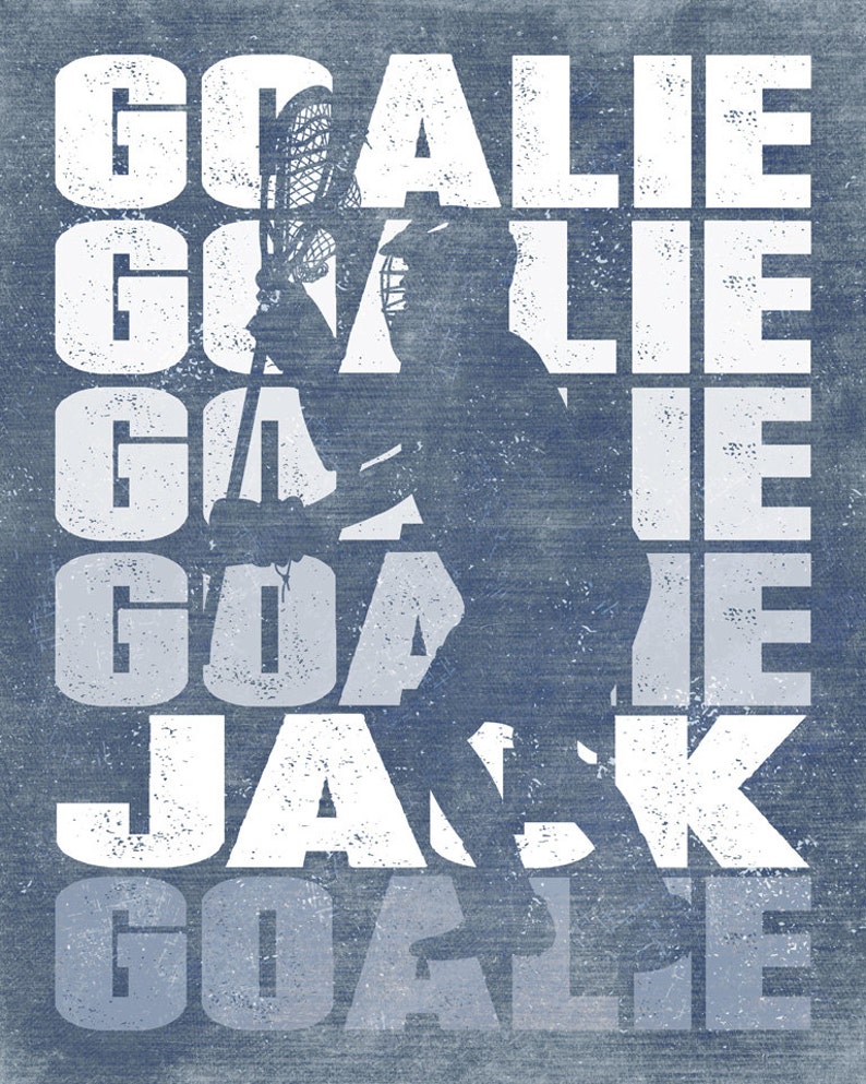 May include: A white graphic design with the word "GOALIE" repeated five times, with the word "JACK" in the middle. The graphic is overlaid on a blue background with a silhouette of a lacrosse player holding a lacrosse stick.
