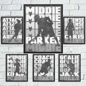 May include: Set of 8 black and white lacrosse player silhouette prints with names and positions. The prints feature the words "Attack", "Middie", "Defence", "Coach", "Goalie", "Austin", "Parker", "Chris", "Kennedy", "Hammer", and "Jack".