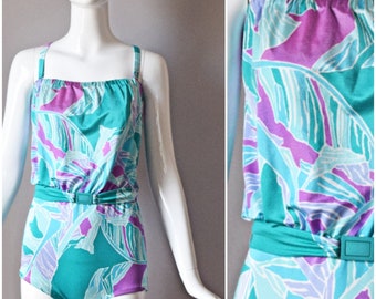 vtg 80s eStewart aqua blue and purple tropical palm leaf floral print full stretch one piece swimsuit swimwear | old school 1970s colorful