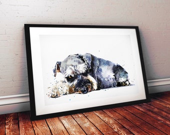 May include: A framed watercolour painting of a Schnauzer dog in a relaxed pose. The artwork features shades of grey, black, and white, with brown and yellow accents. The dog is lying down against a white background, framed in black.